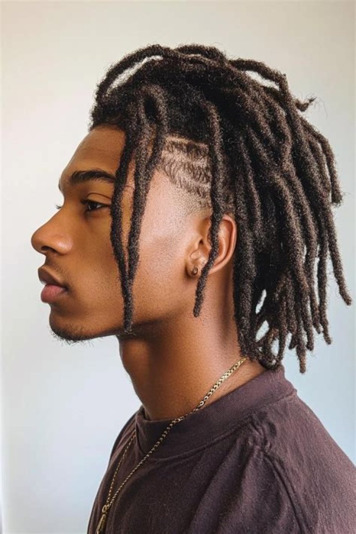 Unlock The Enigmatic World Of Dreadlocks With Shaved Sides For Men